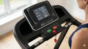 Close-up of the JTX Slimline digital console showing speed, distance, and calorie tracking for home workouts.