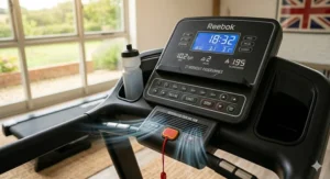 The digital console of a Reebok Jet 300 treadmill featuring 27 workout programmes and integrated cooling fan.