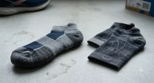 Running socks with targeted heel and toe cushioning to provide extra comfort and impact protection on treadmill decks.