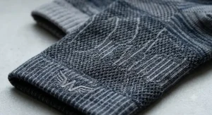 Close-up of breathable fabric technology in running socks designed to keep feet dry during intense treadmill workouts.
