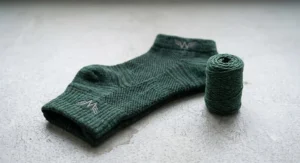Performance socks with a snug fit to prevent slipping inside running trainers while maintaining pace on the treadmill.