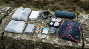 A runner wearing a high-performance race vest for ultramarathon training on a scenic British trail path.
