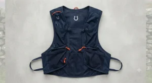 Side profile of a runner demonstrating the snug, bounce-free fit of a race vest for ultramarathon events.