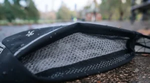 Lightweight, moisture-wicking breathable mesh fabric on the back panel of a running waist belt to prevent chafing in warm weather.
