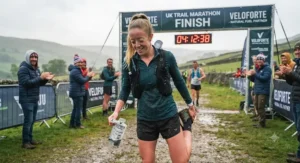 Runner stretching after completing a long-distance run fuelled by caffeine-free energy gels.