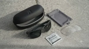 Runner wearing stylish, affordable sports sunglasses during a weekend 10k road run.