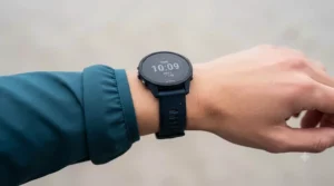 A lightweight, ergonomic sports watch design fitted comfortably on a runner's wrist during interval training.